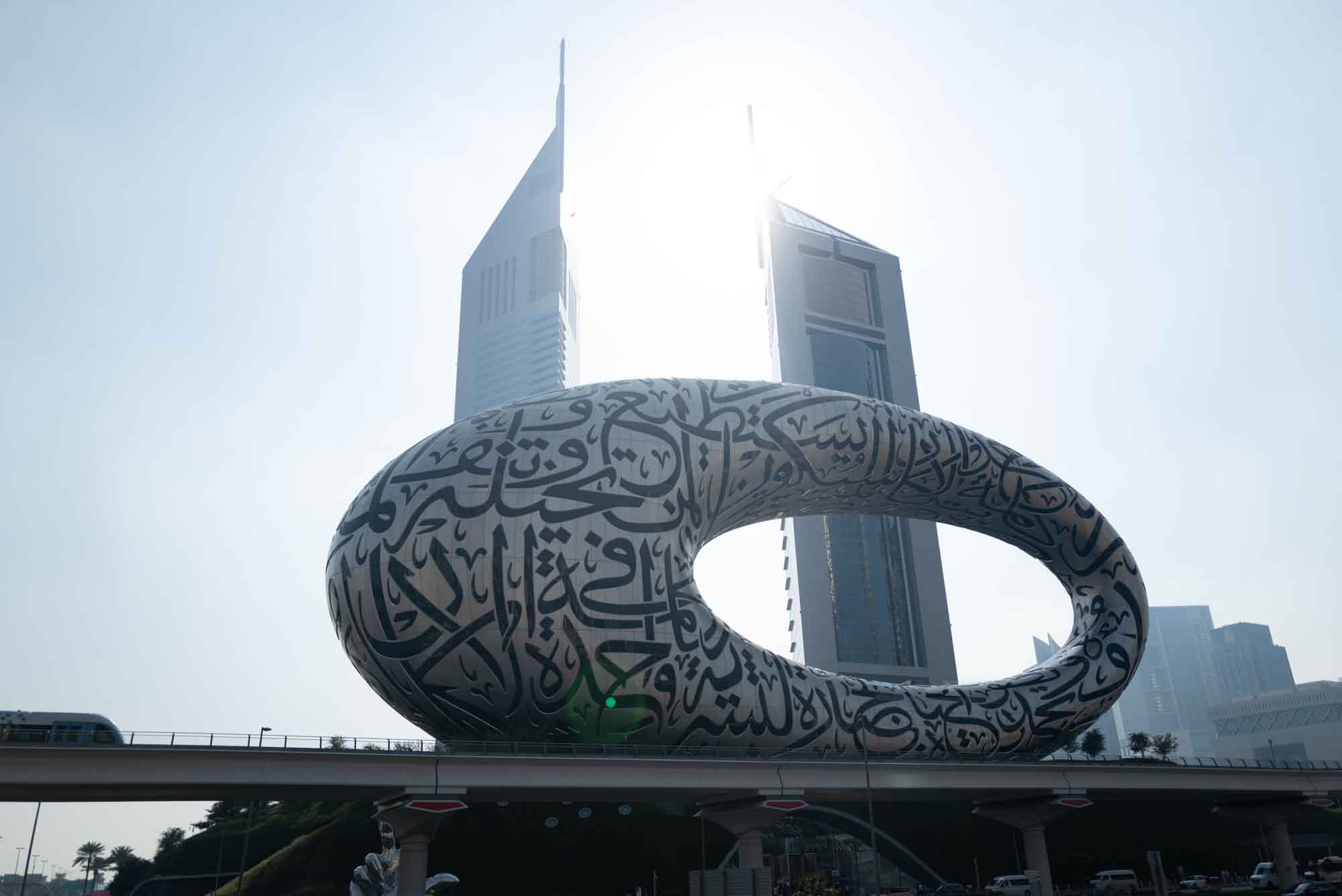 Futuristic Museum of the Future building with Arabic calligraphy in Dubai, set against the skyline.