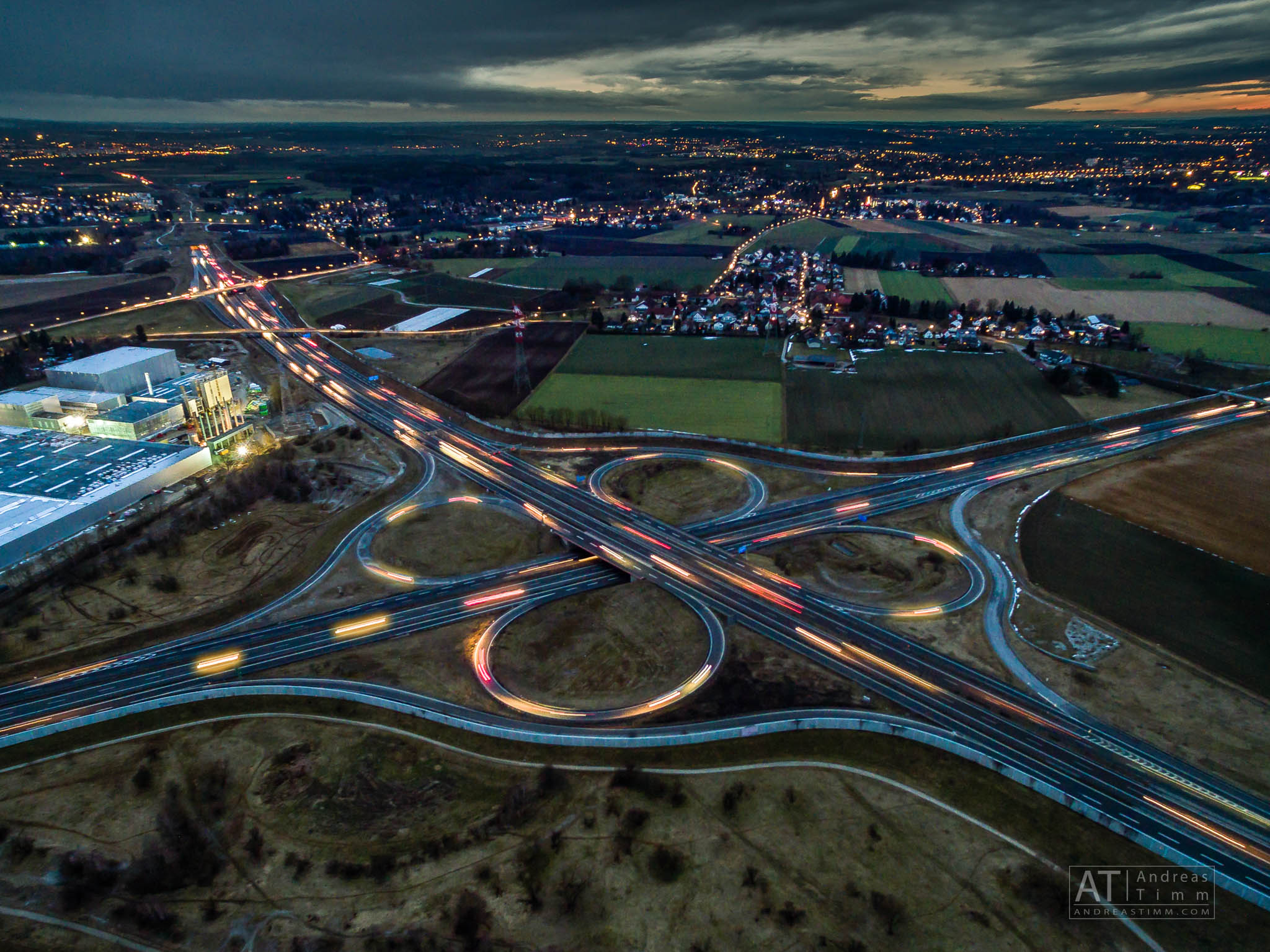 Autobahn at Night – Aerial Light Trails Above the Highway