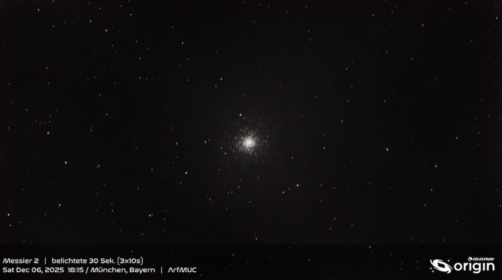 Bright star cluster Messier 2 surrounded by stars in a dark night sky.