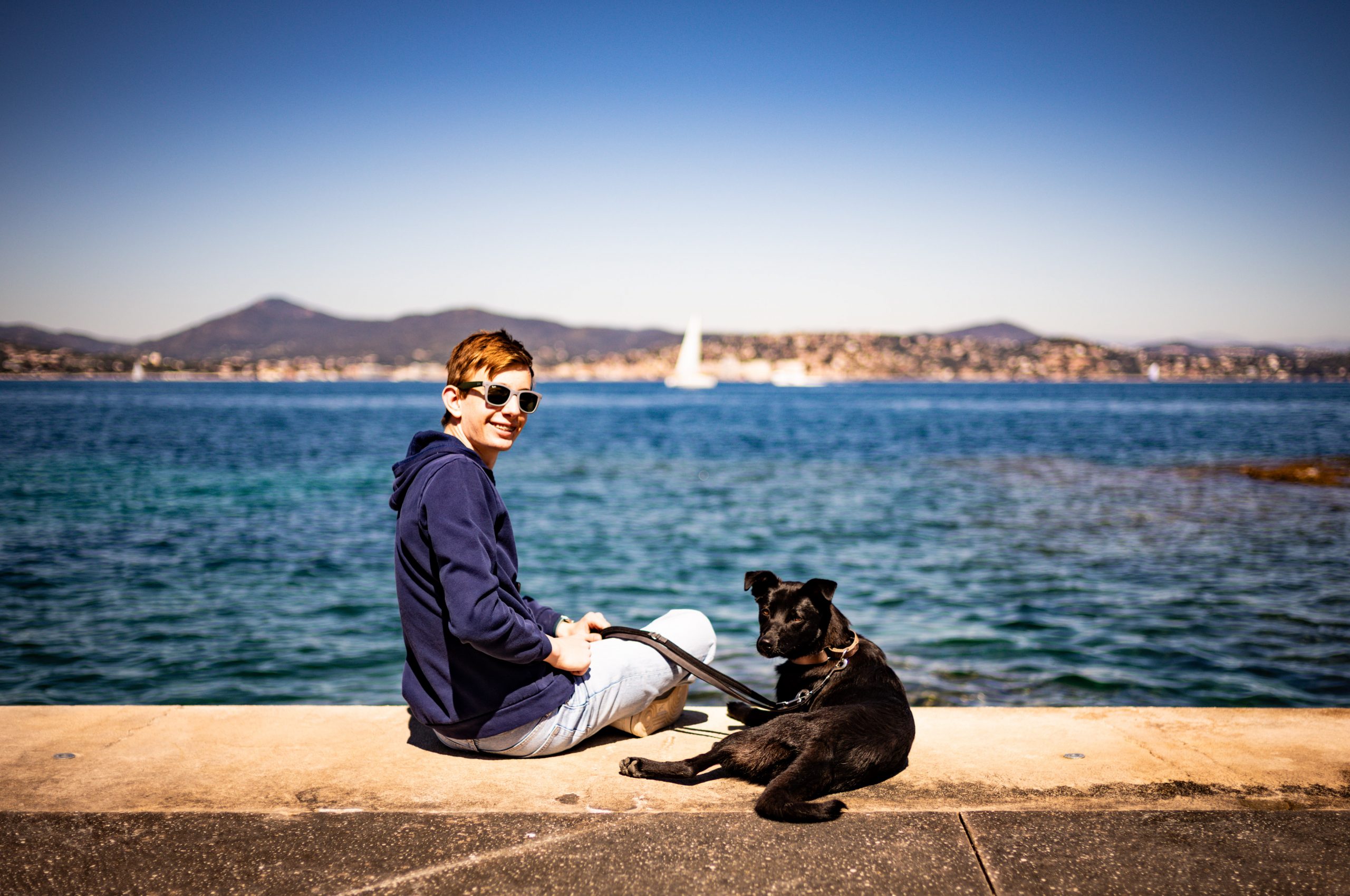 Boy with Dog at Saint-Tropez Waterfront